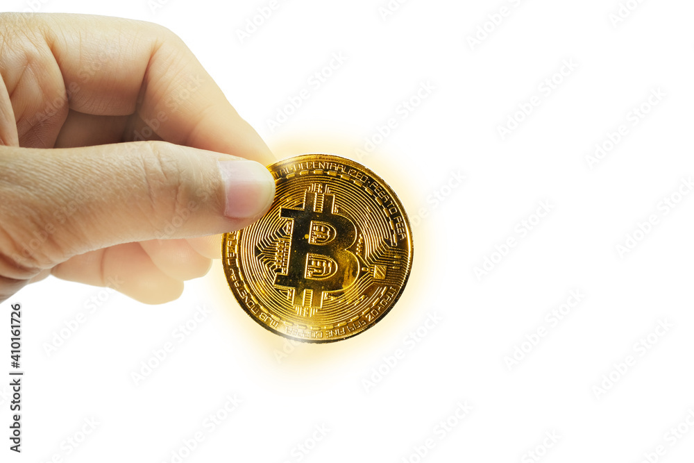 Hand holding Gold bitcoin on white background Hand holding Gold bitcoin on white background