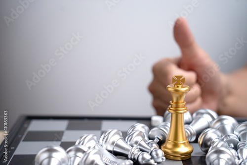Only one gold King chess can stand in the group of falling silver chess concept business win victory