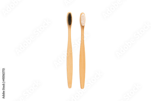 Natural bamboo toothbrushes on a white isolated background. Oral care and dental health. The concept of a future without plastic waste. Zero waste concept. Copy space. view from above