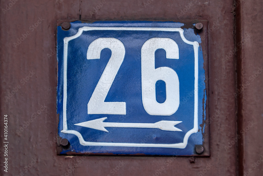 Weathered grunge square metal enameled plate of number of street address with number 26 Weathered grunge square metal enameled plate of number of street address with number 26