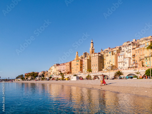 View on old part of Menton, Provence-Alpes-Cote d'Azur, France Europe during summer, couple men and woman on vacation at Menton France photo