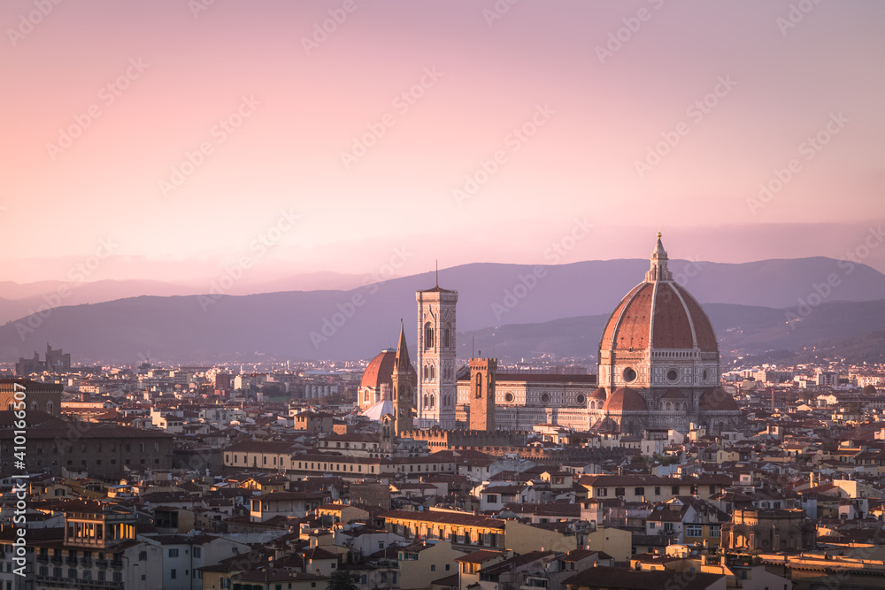 A sunset view of old town Florence cityscape skyline, and Cathedral of Santa Maria del Fiore (il duomo) from Piazzale Michelangelo.