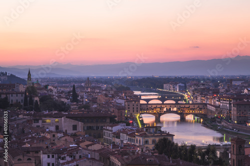A sunset view of old town Florence cityscape skyline, River Arno and Ponte Vecchio from Piazzale Michelangelo. © Stephen