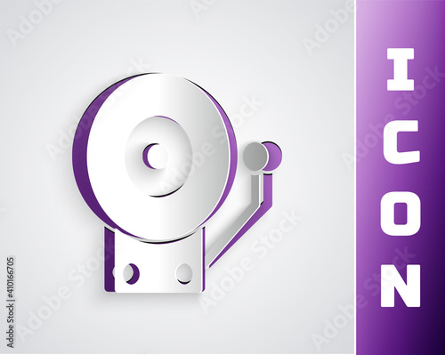 Paper cut Ringing alarm bell icon isolated on grey background. Fire alarm system. Service bell, handbell sign, notification symbol. Paper art style. Vector.