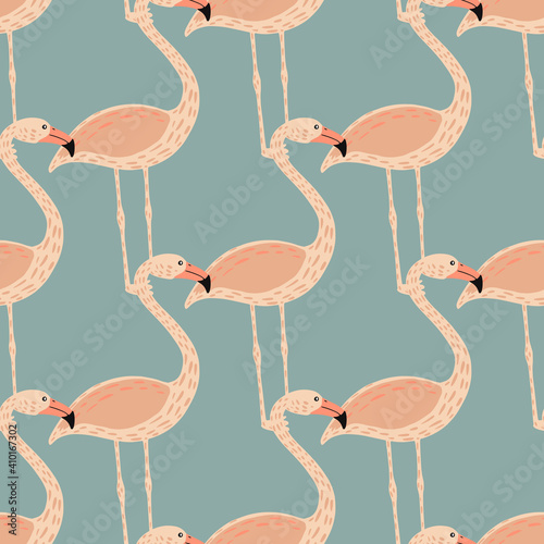 Creative hand drawn seamless pattern with pastel pink flamingo ornament. Blue pastel background.