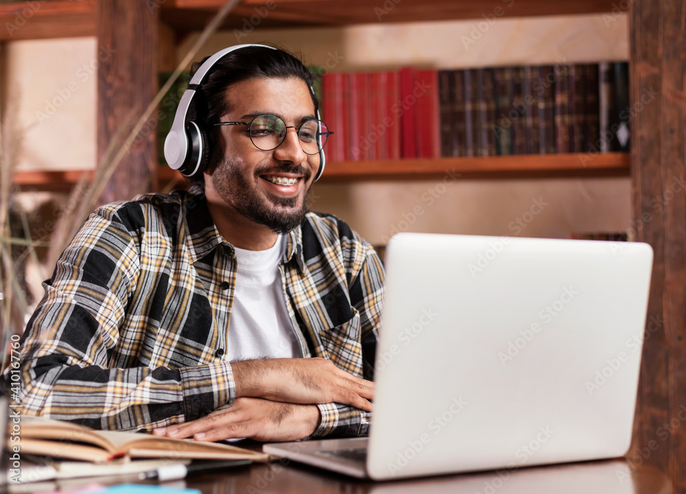 Student Having Online Lecture Via Video Call At Laptop Indoors Student Having Online Lecture Via Video Call At Laptop Indoors