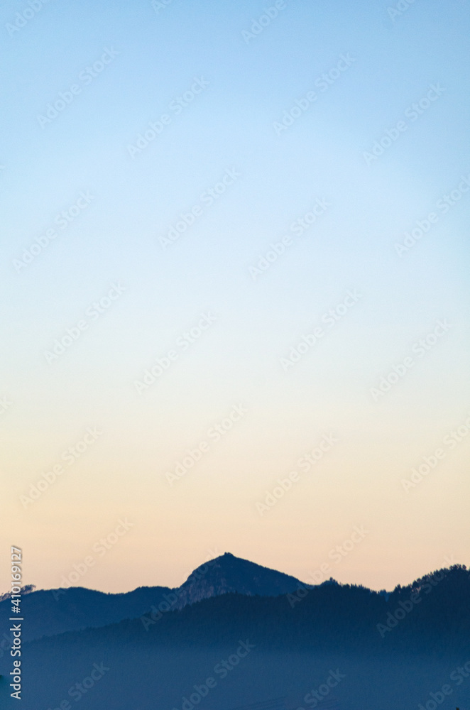 Low angle view of mountains at dawn