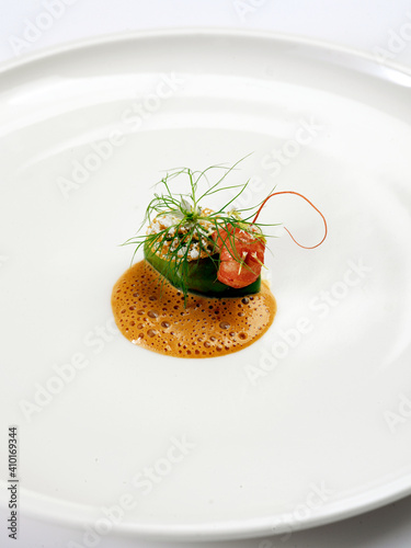 conceptual cuisine food plate served by michelin chef star with schrimp and cancer mustache