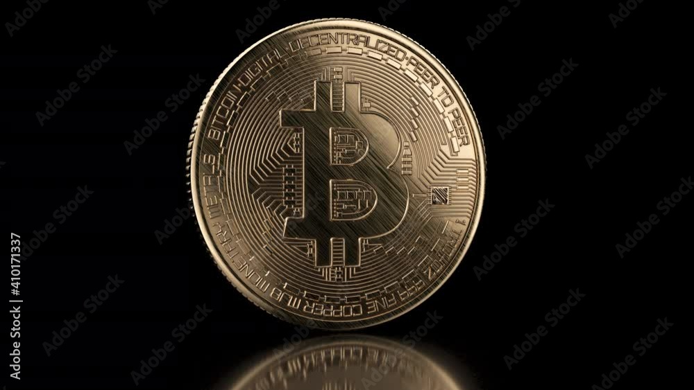 Golden bitcoin coin on black background rotating. Popular digital currency. Cryptocurrency created, distributed, traded, and stored in decentralized ledger system known as a blockchain. Golden bitcoin coin on black background rotating. Popular digital currency. Cryptocurrency created, distributed, traded, and stored in decentralized ledger system known as a blockchain.