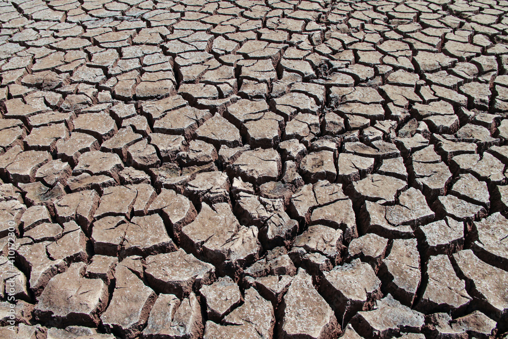 The drought land texture in Thailand. The global shortage of water on the planet. Global warming and greenhouse effect concept. The drought land texture in Thailand. The global shortage of water on the planet. Global warming and greenhouse effect concept.