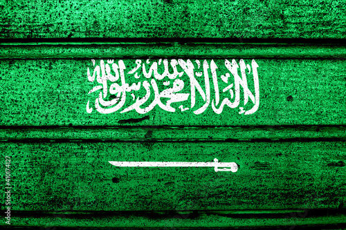 National flag of Saudi Arabia, abbreviated with sa; a realistic 3d image of the national symbol from an independent country painted on a wooden wall