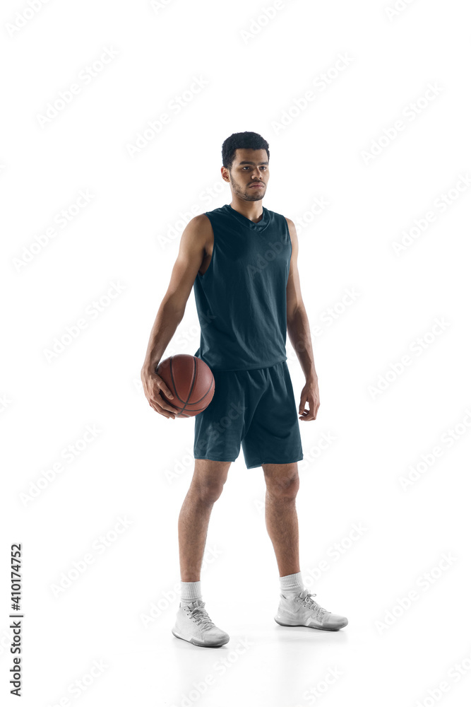 Achievements. Young arabian muscular basketball player posing confident isolated on white background. Concept of sport, movement, energy and dynamic, healthy lifestyle. Training, practicing. Achievements. Young arabian muscular basketball player posing confident isolated on white background. Concept of sport, movement, energy and dynamic, healthy lifestyle. Training, practicing.