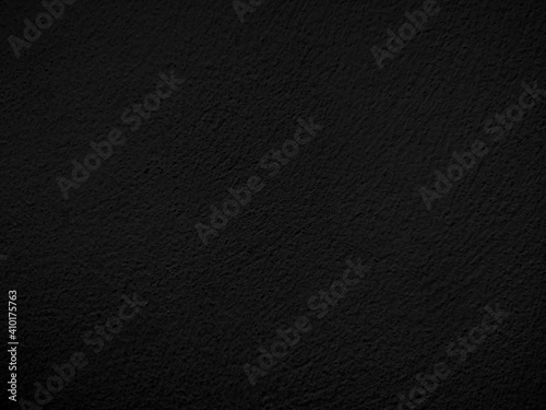 black color​ paint​ on Cement​ wall​ concrete textured background​ abstract​ grey​ color​ material​ smooth surface