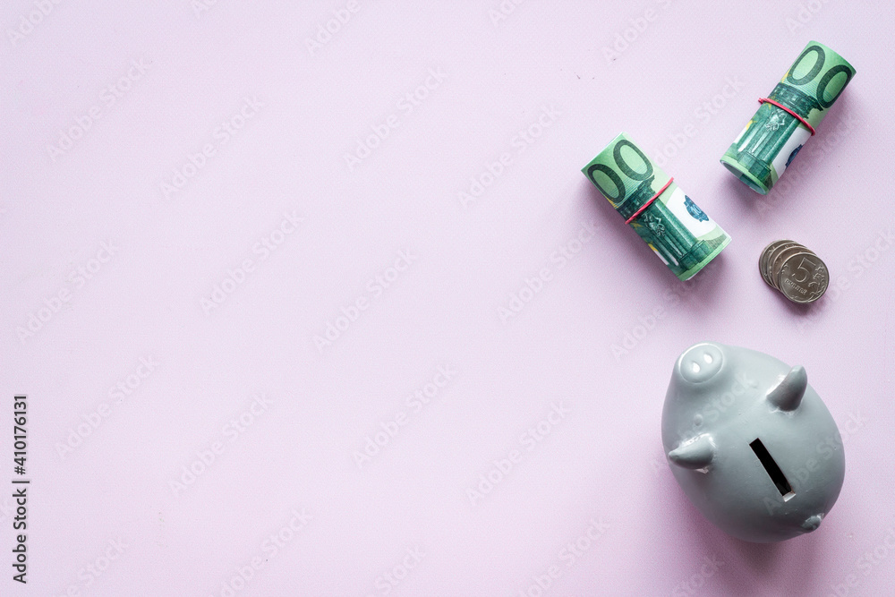 Top view of piggy bank with money coins. Savings concept Top view of piggy bank with money coins. Savings concept