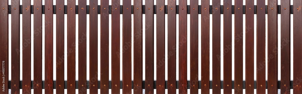 Panorama of Dark brown hardwood fence isolated on a white background Panorama of Dark brown hardwood fence isolated on a white background