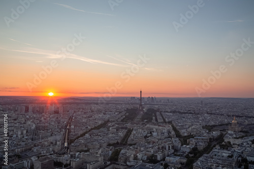 Sunset view of the Eiffel Tower and the city of Paris taken from Montparnasse Tower.