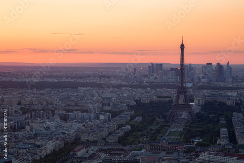 Sunset view of the Eiffel Tower and the city of Paris taken from Montparnasse Tower.
