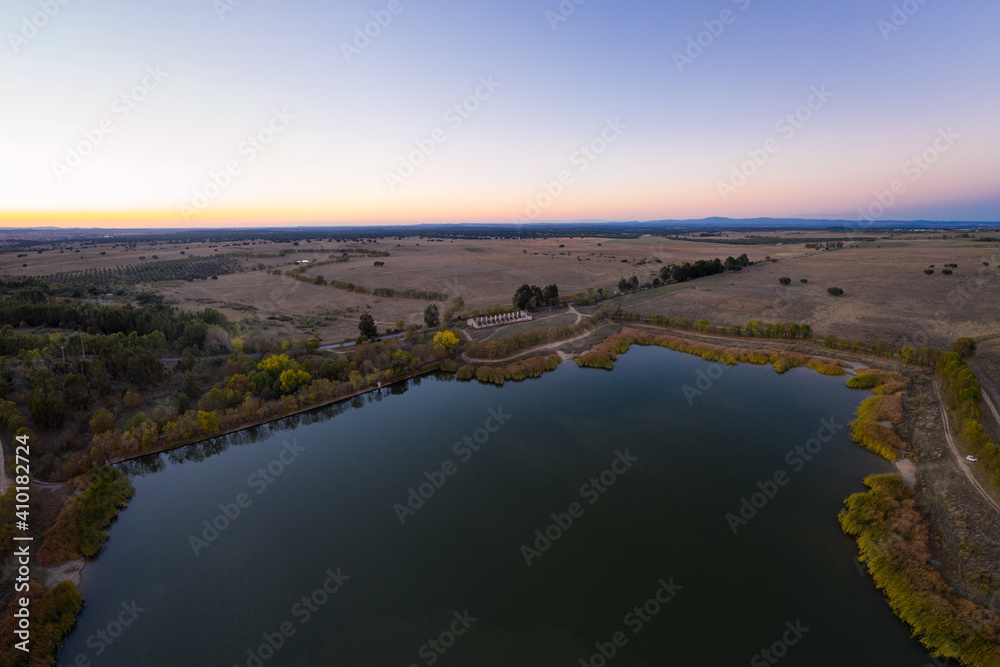 Lake drone aerial view at sunset in Alentejo, Portugal