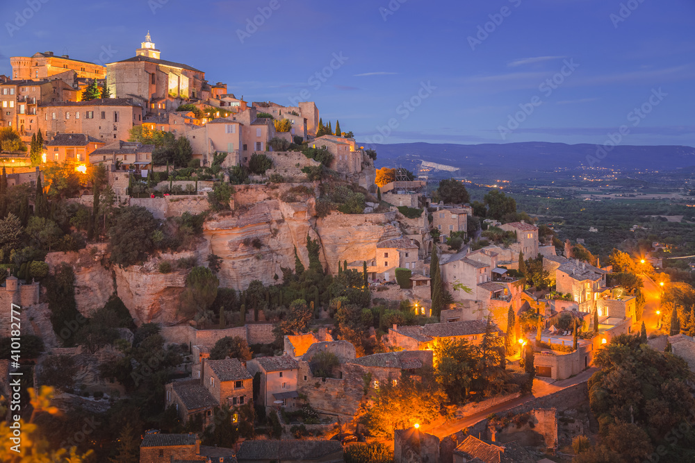 A stunning summer's evening view of the beautiful and historic hilltop village of Gordes, in Provence France