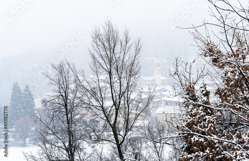 Winter landscape of the small village Ferrera di Varese located in the hills north of Varese, Lombardy, Italy photo