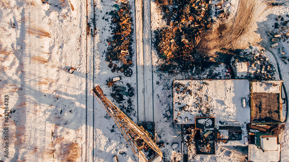 Aerial photography of a metal dump, A crane unloads, loads metal waste Aerial photography of a metal dump, A crane unloads, loads metal waste