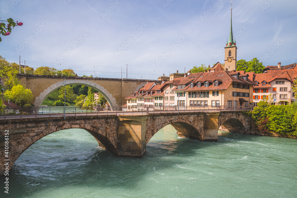 A view over the River Aare in Bern, Switzerland and the historic 14th century Nydeggkirche.