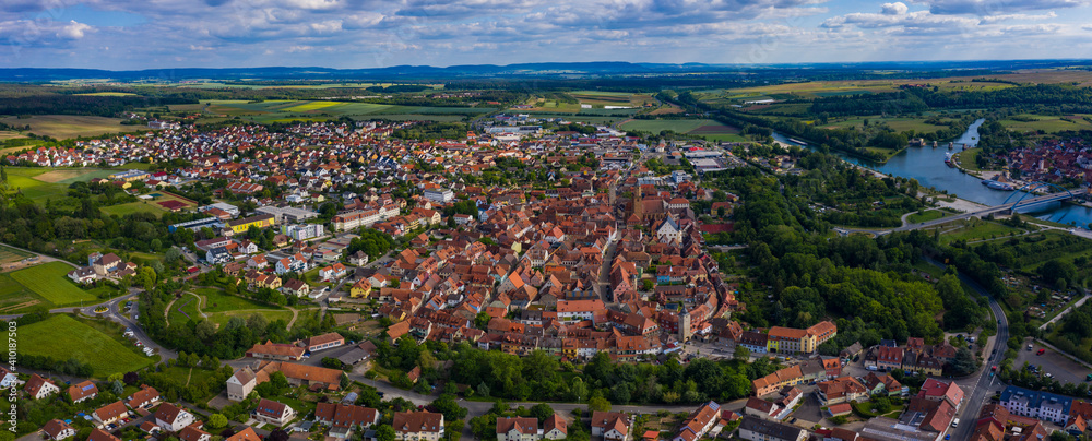 Aerial view of the old town of the city Volkach in Germany on a sunny day in spring.	