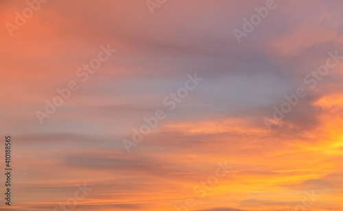 Beautiful colorful bright sunset sky with orange clouds. Nature sky background. Dramatic sunset. © Inga Av