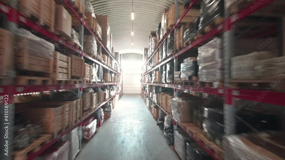 Warehouse or stock of materials, racks, boxes, containers. Shelves with goods or commodity Warehouse or stock of materials, racks, boxes, containers. Shelves with goods or commodity