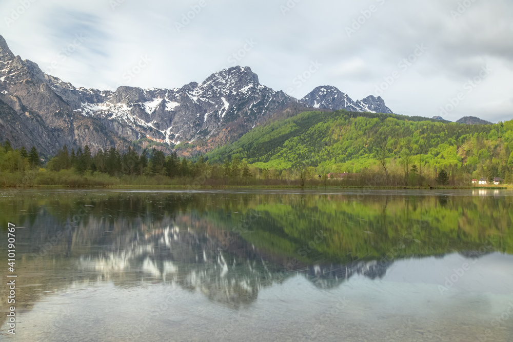 A calm day at Lake Almsee in Upper Austria's part of the Salzkammergut in the Almtal valley.