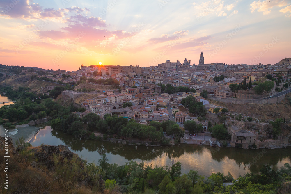 View of the historic town of Toledo, Spain and the Tagus River at sunset