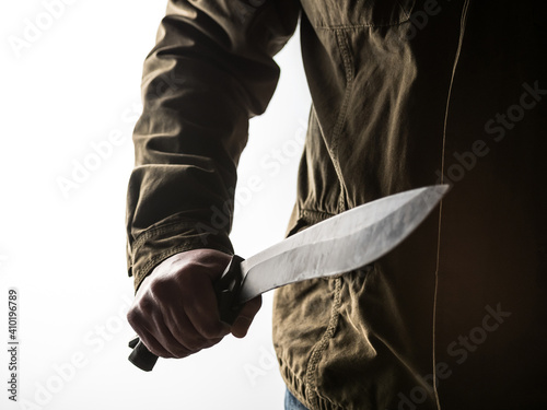 Man holding a machete in his hand