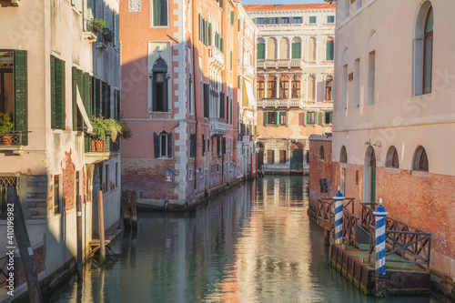 A sunny day on a quiet Venetian canal in Venice, Italy.