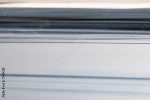 Defocused abstract background with soft color stripes.