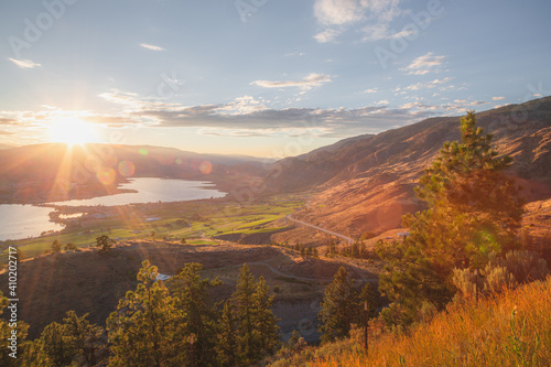 A sunset view of the Okanagan vineyards and orchards in Osoyoos, B.C. Canada, which is renowned wine country in the Okanagan Valley. photo