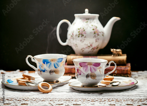 cup of tea and teapot on table