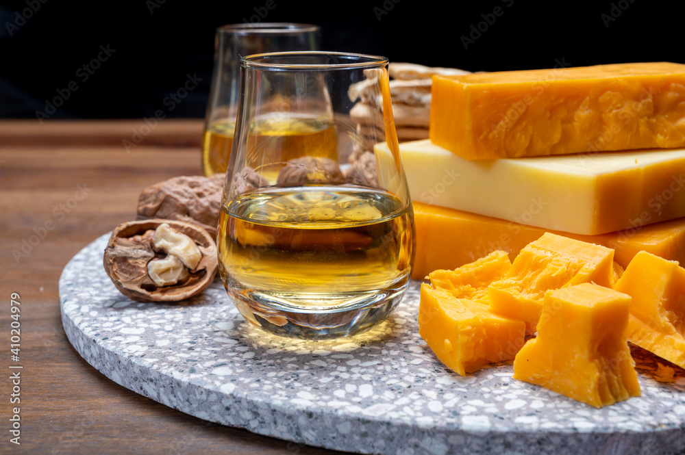 Cheese collection, orange and yellow smoked British cheese from England Cheese collection, orange and yellow smoked British cheese from England
