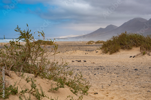 sand dunes in the desert with Cofete beach view