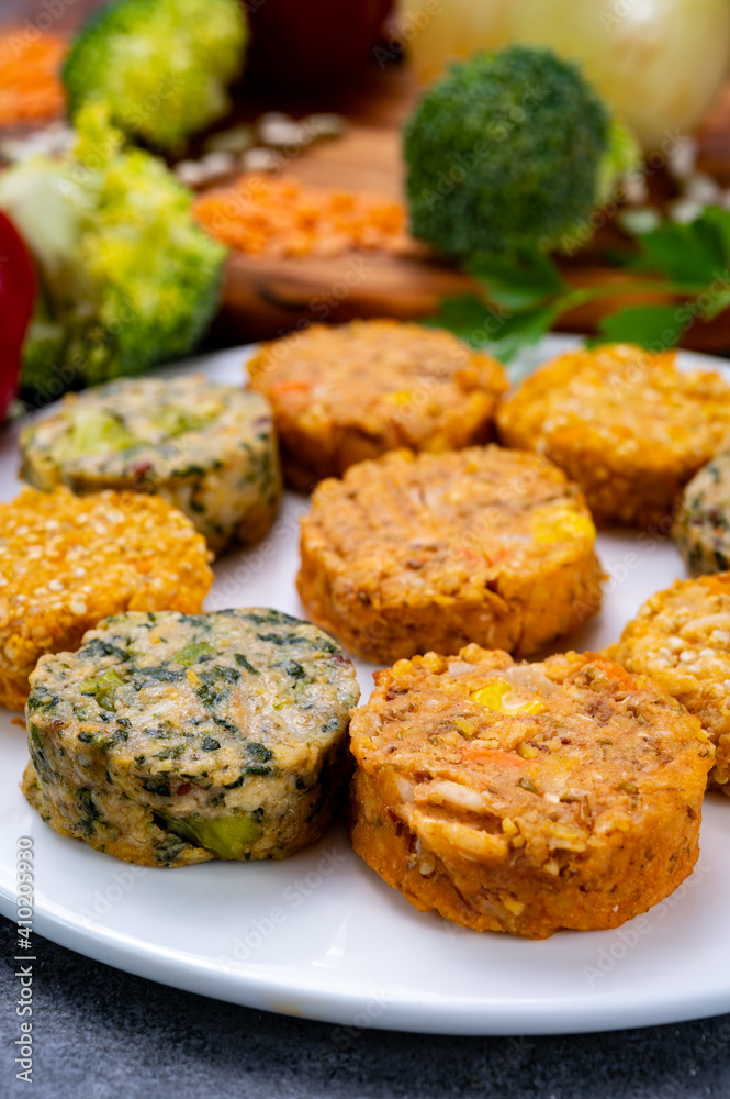 Small tasty vegan and vegetarian burgers made from fresh vegetables and dried legumes and beans