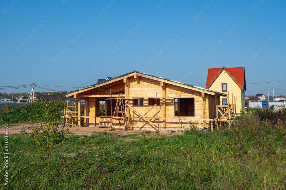 Construction of a wooden house on a private plot