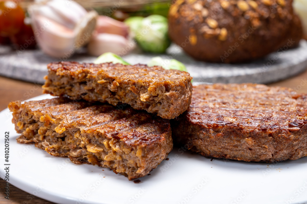 Grilled plant based, meat free vega burgers close up