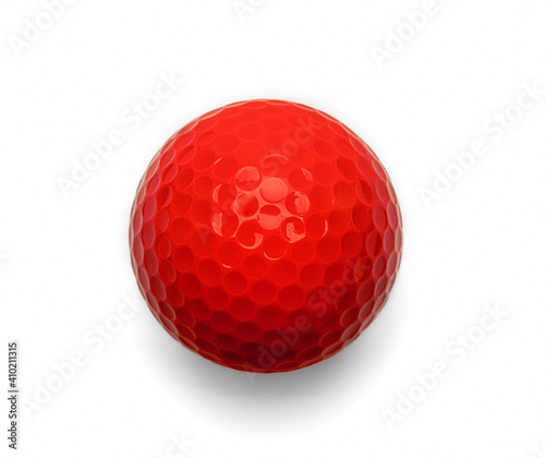 orange golf ball on white photo