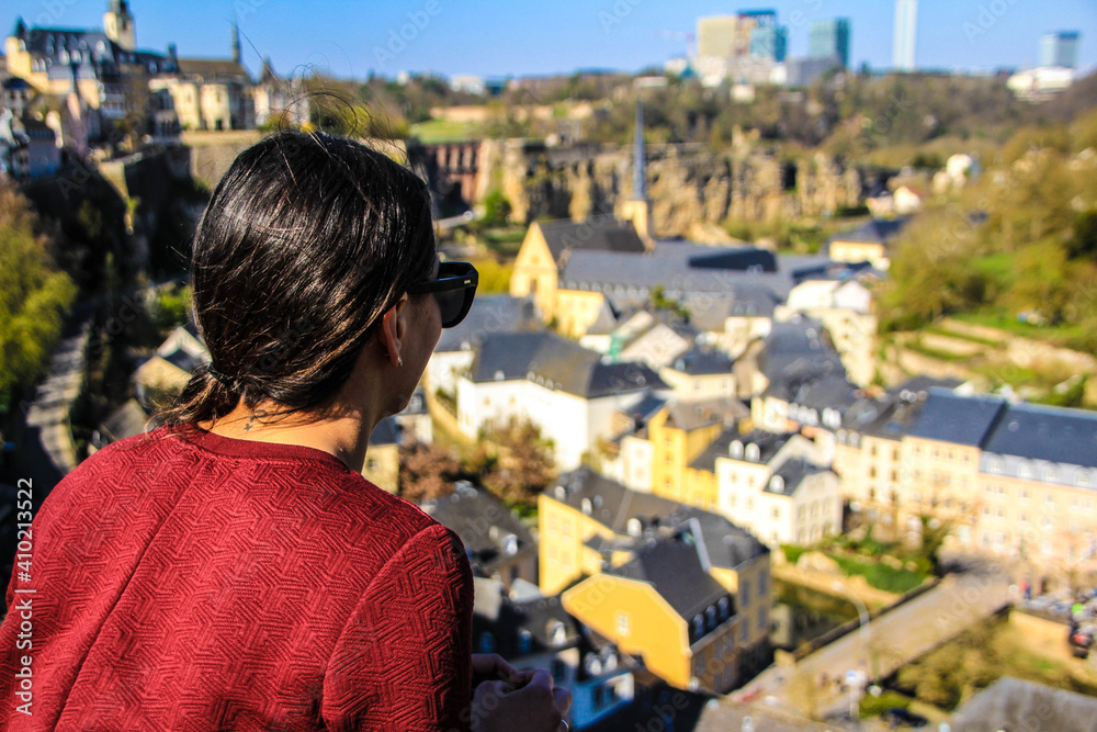 Fototapeta premium latin girl enjoying the view at a luxembourg lookout point 