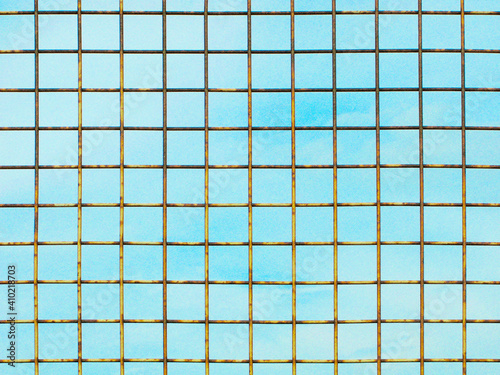 Metal lattice against light blue sky, illustration