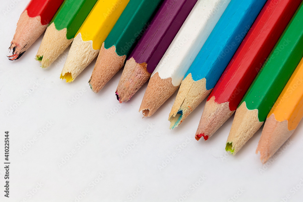 Set of old used and broken colored pencils on a white background. Ugly worn crayons or pencils with broken ends should be sharpened. Creativity, broken things or kids concept. Set of old used and broken colored pencils on a white background. Ugly worn crayons or pencils with broken ends should be sharpened. Creativity, broken things or kids concept.