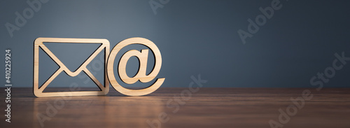 Email symbol at commercial and envelope. photo
