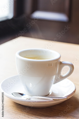 a cup of espresso on a table in a bar  cafe  restaurant