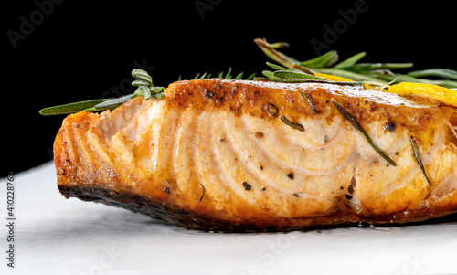Salmon with lemon steak, decorated with rosemary.