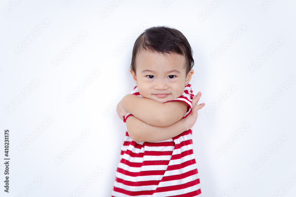 Portrait of Asian baby boy smiling with crossed arms on white background, Confident and cheerful kids concept. Portrait of Asian baby boy smiling with crossed arms on white background, Confident and cheerful kids concept.