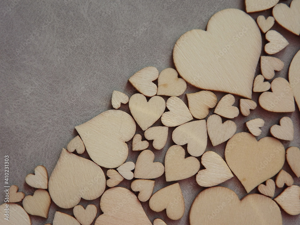 valentine's day greeting card-wooden hearts on a gray suede background. High quality photo valentine's day greeting card-wooden hearts on a gray suede background. High quality photo